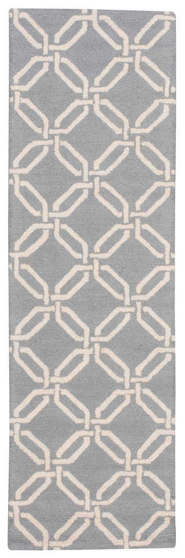 Close-up of the Nourison Linear Light Blue rug, featuring a geometric chain-link pattern and wool texture.