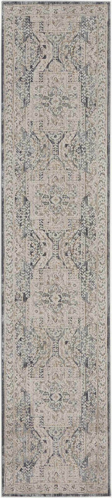Close-up of the Nourison Lynx Ivory Charcoal Vintage Area Rug, showcasing its taupe, charcoal, and ivory vintage pattern.