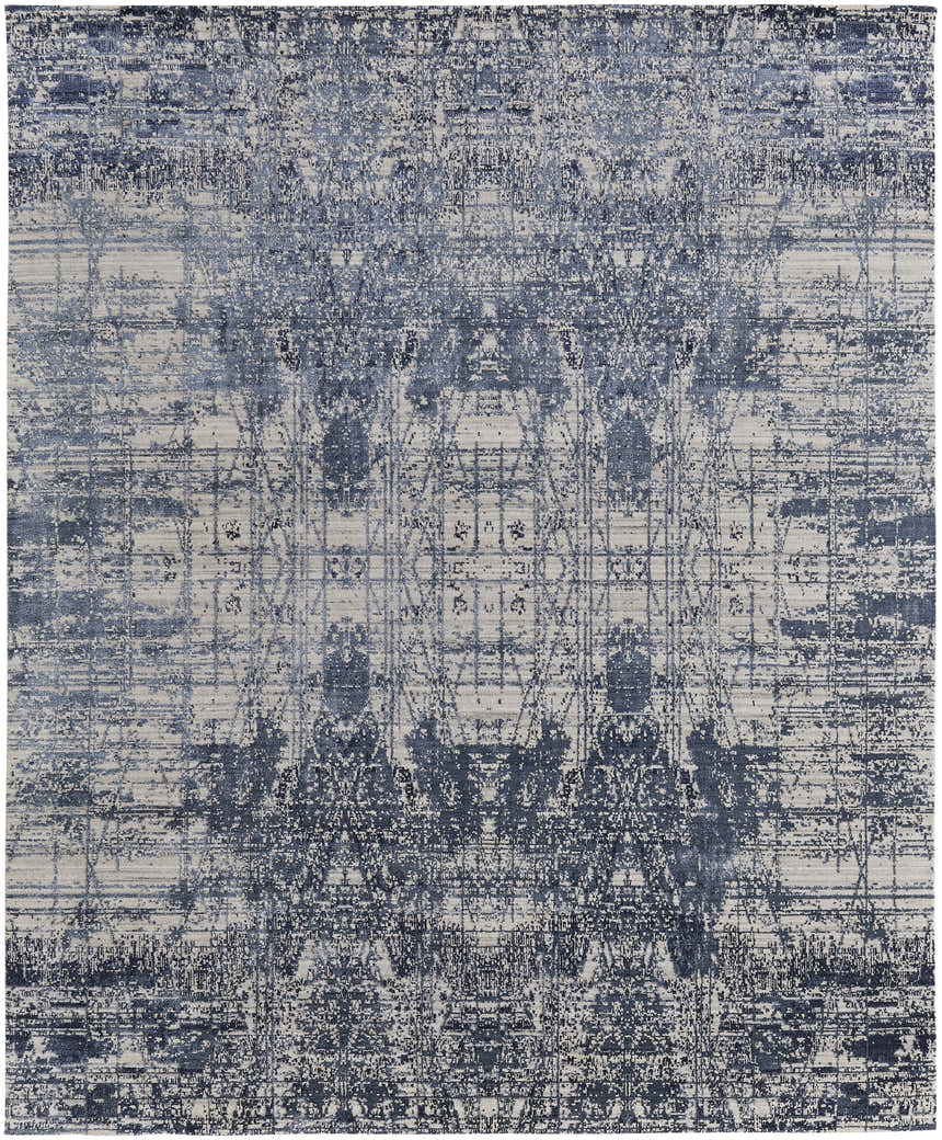 Close-up of the Feizy Eastfield Rug, a modern area rug with a distressed geometric overlay in blue and ivory tones. Design-Rectangle