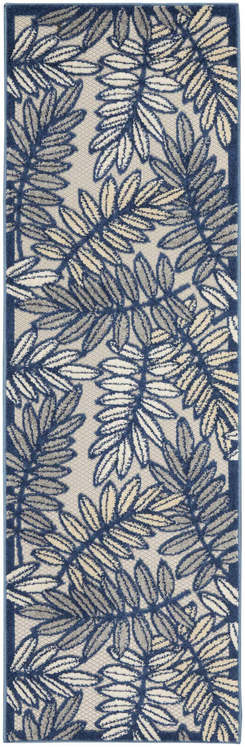 Close-up of the Nourison Aloha Ivory Navy Tropical Area Rug featuring a leaf pattern in navy, ivory, and gray.