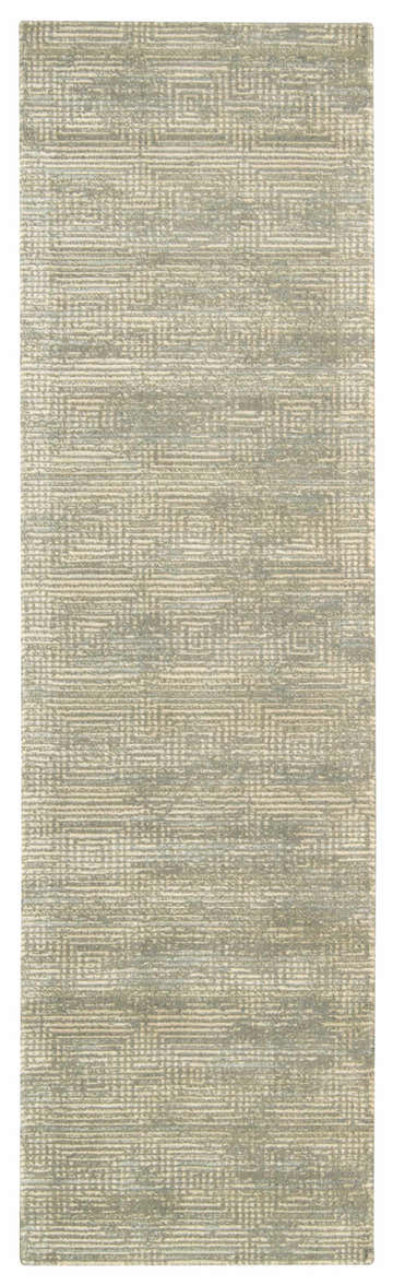 Close-up of Calvin Klein Home Maya Mineral rug. Handmade runner rug with a geometric pattern in mineral and cream.
