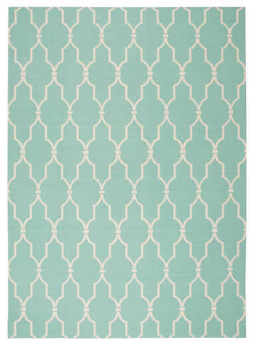 Aqua Nourison Home & Garden rug. Contemporary quatrefoil design in aqua and ivory. Machine-made polyester rug.