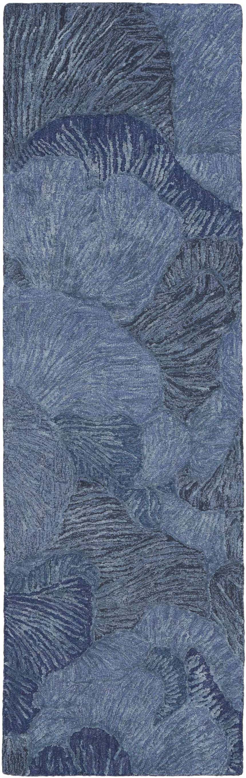 Close-up of the Nourison Avra Blue rug, showcasing its abstract, textured pattern and light blue color variations.
