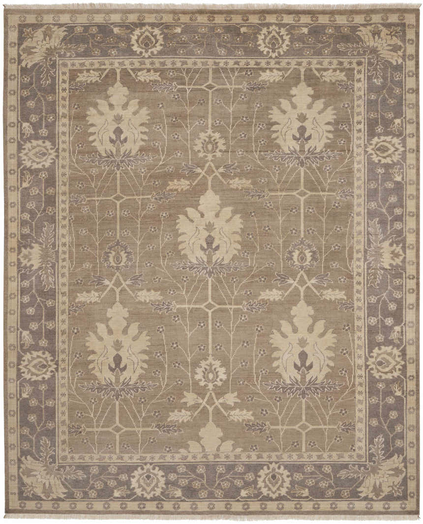 Close-up of the Nourison Aldora Opal Gray vintage rug. Features a floral pattern and a gray border with fringe.