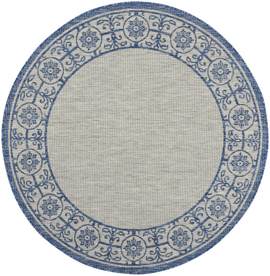 Close-up of round Nourison Country Side Ivory Blue rug with a transitional floral and scroll border pattern.