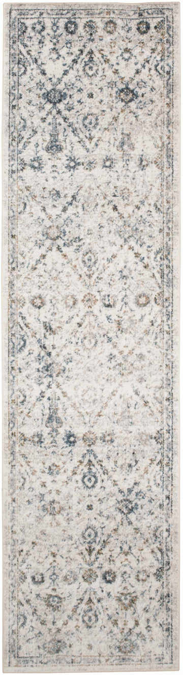 Close-up of Nourison Astra Ivory Blue Vintage Rug. Machine-made runner with chestnut, ivory, and blue floral pattern.