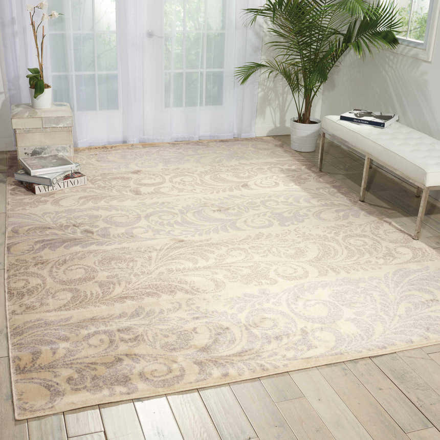Bright room scene with Nourison Utopia Ivory Floral rug, white bench, and natural light.