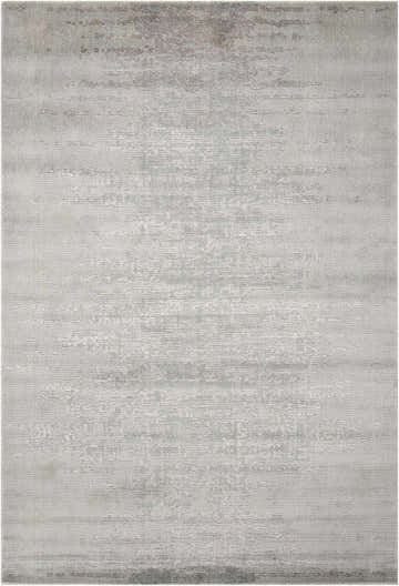 Close-up of the Nourison Twilight Seafoam rug. Sage green wool and luxcelle blend with a subtle, modern abstract pattern.