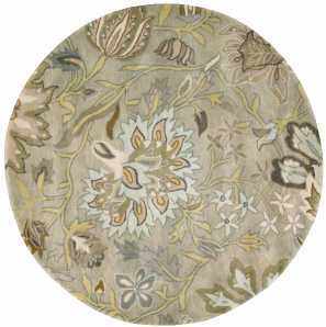 Close-up of round Nourison Jaipur Silver Floral Indoor Area Rug. Gray wool rug with a botanical floral pattern.
