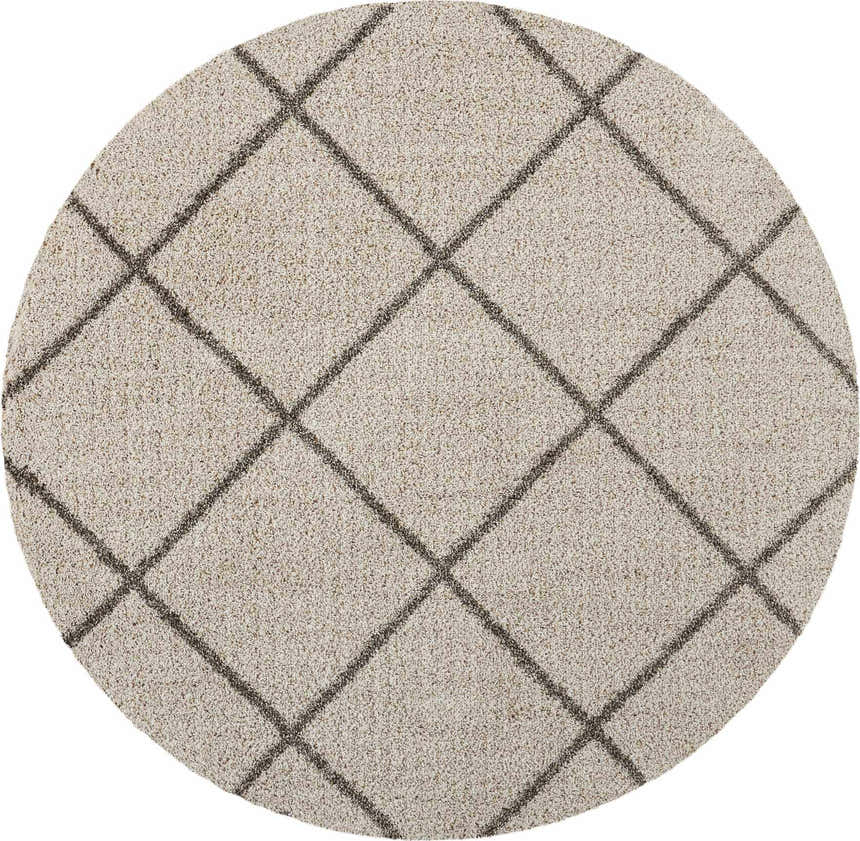 Close-up of a round Nourison Brisbane Cream Shag Indoor Area Rug with a geometric diamond pattern. Cream color.