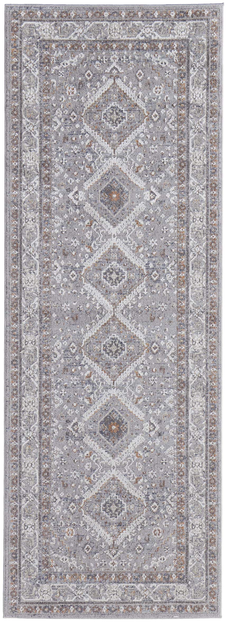 Close-up of Feizy Francisco Transitional Medallion Rug in gray, ivory, and orange. Features a detailed diamond pattern. Design-Runner