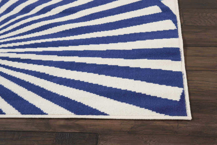 Close-up of the Nourison Grafix White Contemporary Indoor Area Rug with a blue and white striped pattern.
