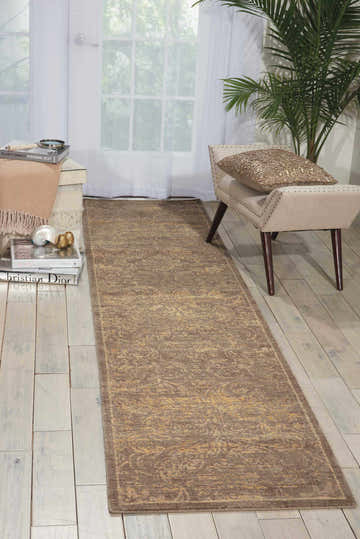 Light, airy room with Nourison Silken Allure Mushroom Persian runner rug on whitewashed wood floor. Bench and plant complete the scene.