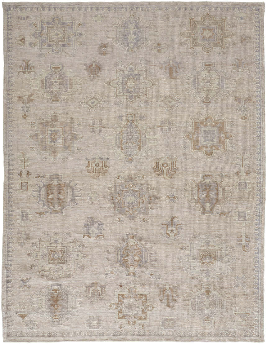 Close-up of the Feizy Wendover Tan/Brown Area Rug. Hand-knotted rug with a transitional oriental pattern. Neutral tones. Design-Rectangle