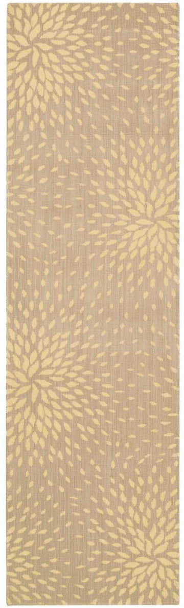 Close-up of Nourison Capri Beige Floral Area Rug. Beige background with stylized floral pattern. Wool runner rug.