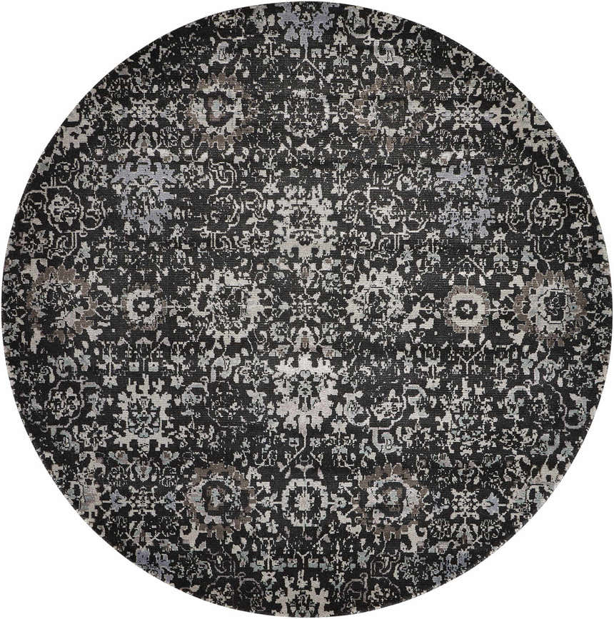 Close-up of round Nourison Twilight Onyx Persian rug. Black, gray, and ivory tones create a distressed floral pattern.