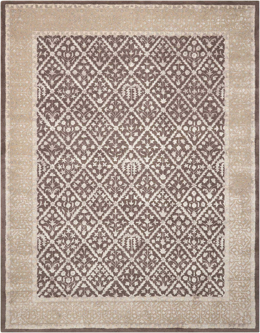 Close-up of Nourison Symphony Charcoal rug, featuring a taupe floral trellis pattern and handmade construction.