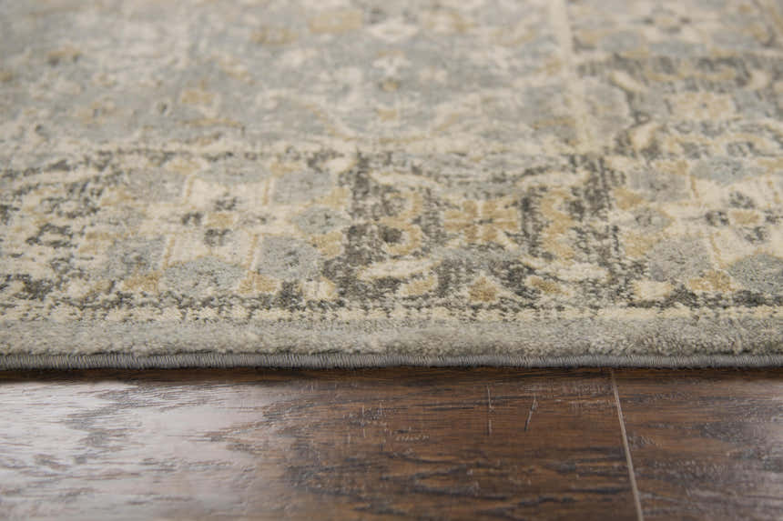 Close-up of Rizzy GS6796 area rug showing beige, dark red, and gray tones with a subtle farmhouse pattern. Pile
