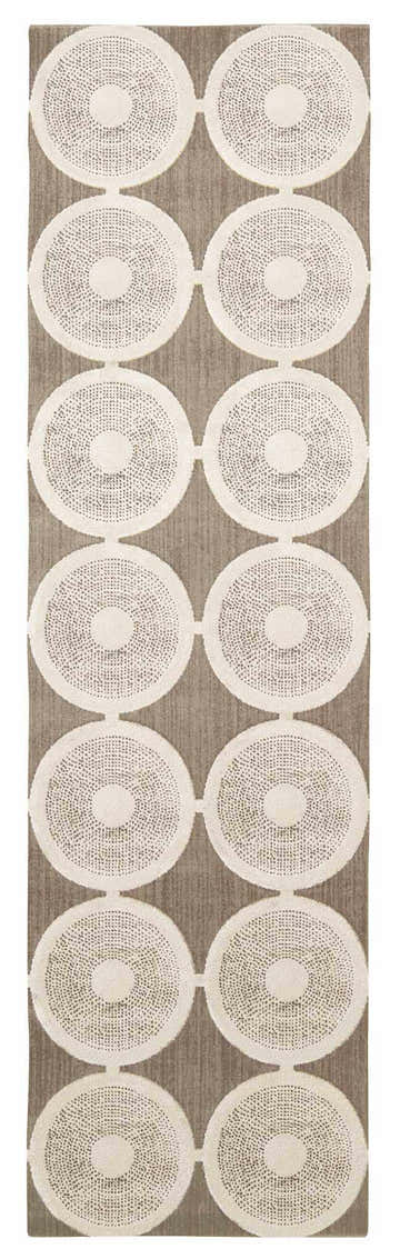 Close-up of Nourison Luminance Feather Vintage rug. Taupe background with connected, textured ivory circles. Handmade rug.