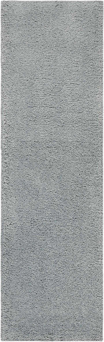 Close-up of the plush Nourison Malibu Shag Slate rug, showing its soft, dense texture and subtle taupe color.