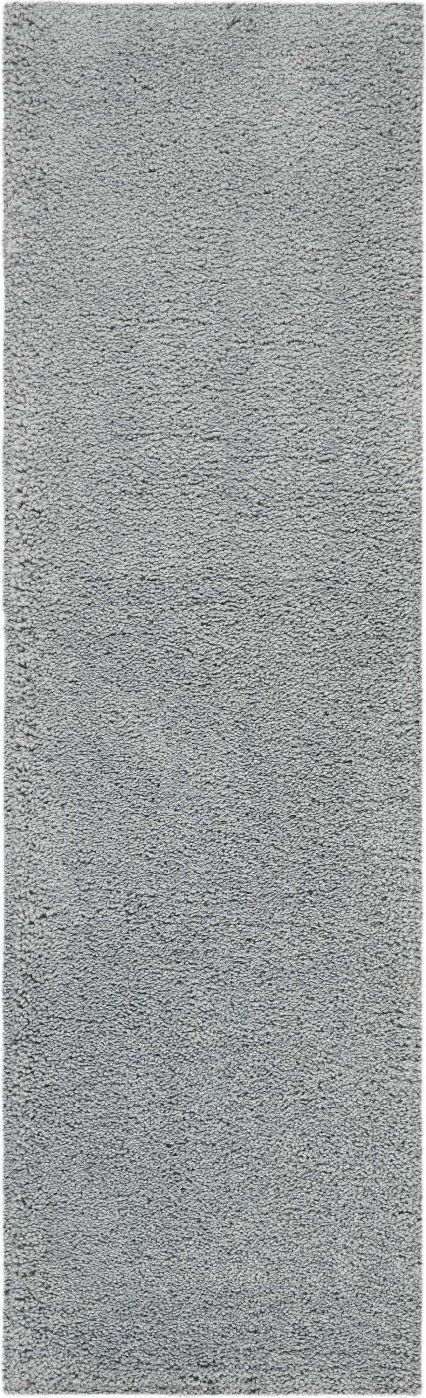 Close-up of the plush Nourison Malibu Shag Slate rug, showing its soft, dense texture and subtle taupe color.