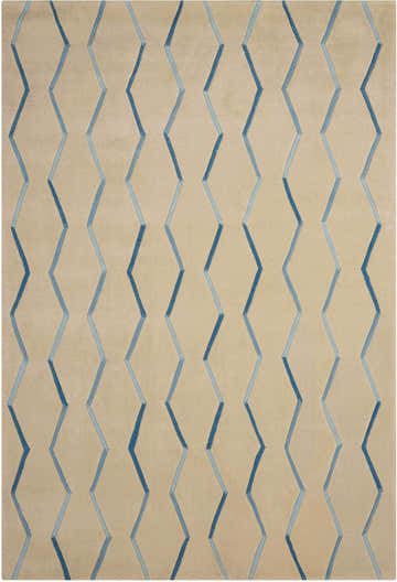Close-up of Nourison Contour Ivory Colorful Area Rug. Beige rug with blue and light blue geometric zigzag pattern.