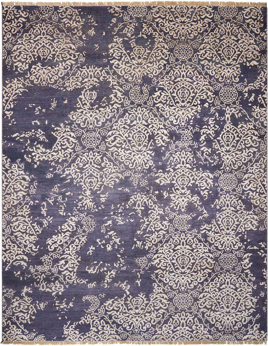 Close-up of the Nourison Aldora Royal Vintage rug. Features a distressed royal blue and cream floral damask pattern.
