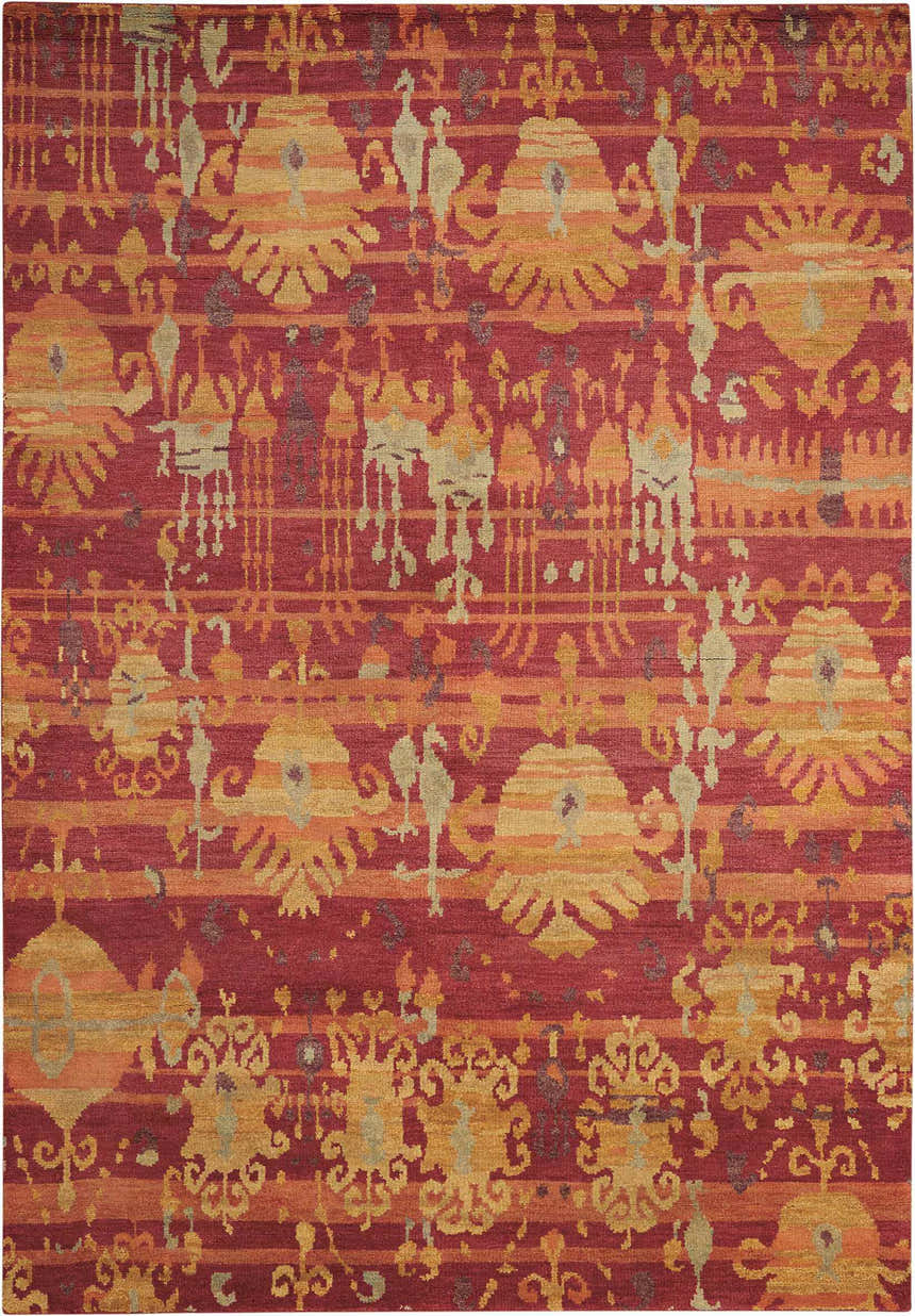 Close-up of the Nourison Dune Flame Persian rug. Handmade wool rug with flame, gold, and tan Persian-inspired pattern.