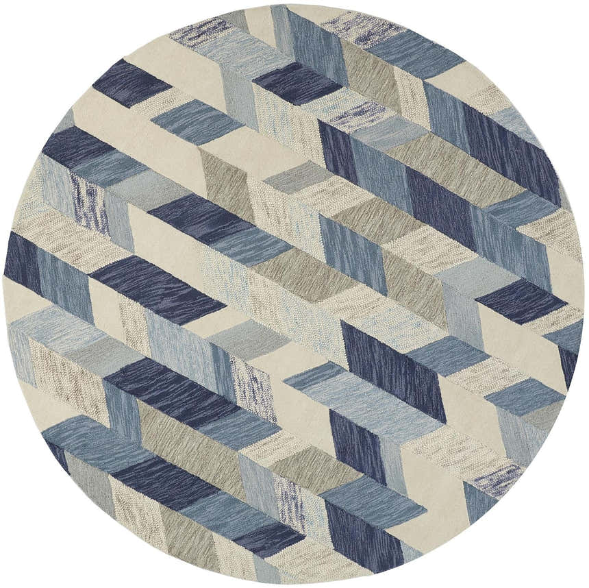 Close-up of a round Feizy Arazad rug. Transitional geometric pattern in blue, ivory, and gray hues. Hand-tufted texture. Design-Round