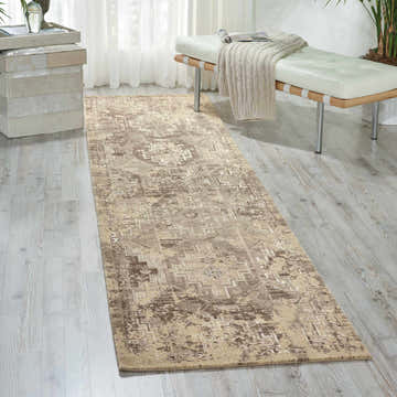 Entryway with Nourison Silk Elements Mushroom Persian runner rug on light wood floors.