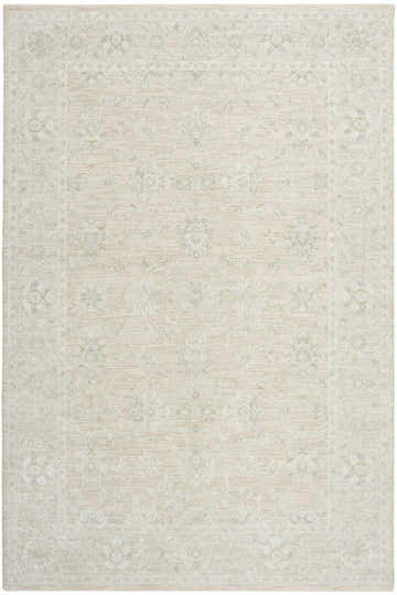 Close up of the Nourison Envy Cream Vintage Area Rug, featuring a subtle floral pattern and soft, high pile texture.