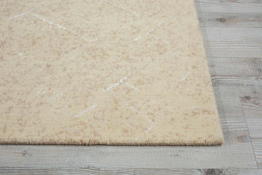 Close-up of the Nourison Silk Elements Natural Persian Rug, showcasing its brick red tones and subtle geometric pattern.