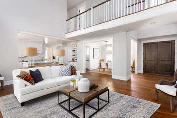 Bright living room with a white sofa and Feizy Nadia Transitional Blue/Gray Area Rug. Roomscene-Rectangle