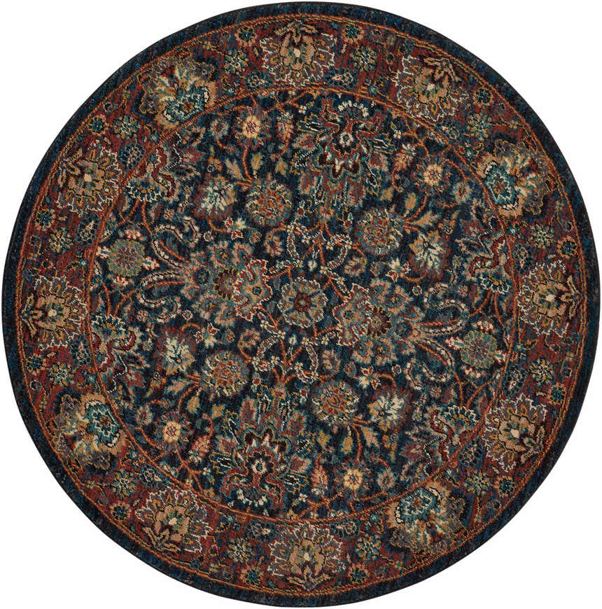 Close-up of a round Nourison 2020 Navy rug. Traditional floral pattern in navy, red, gold, and teal.