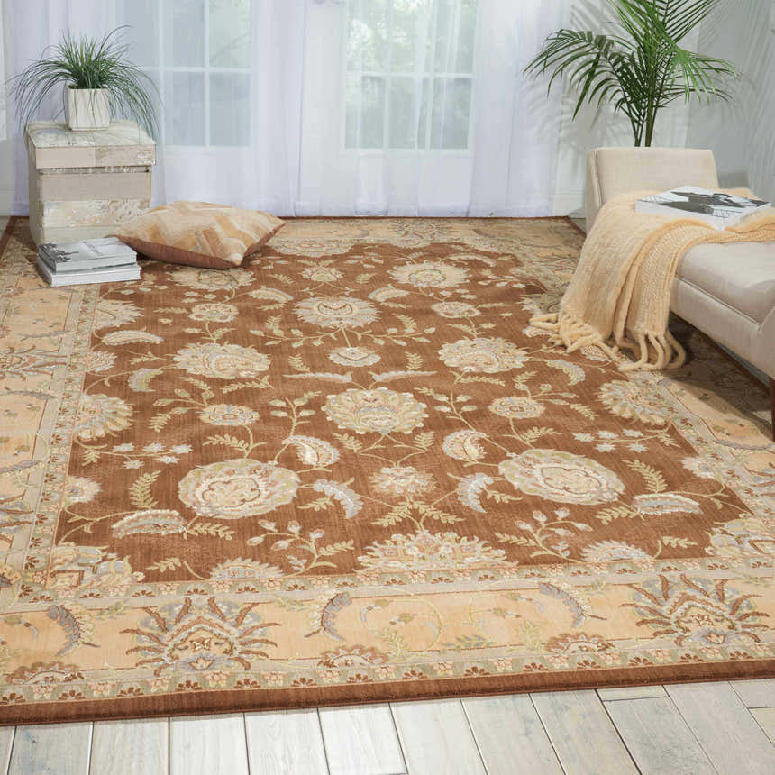 Living room with a Nourison Persian Empire Chocolate rug, featuring a floral pattern and brown tones.