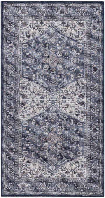 Close-up of Nourison New Concept Navy Ivory Vintage Indoor Washable Area Rug, showing its intricate vintage pattern.