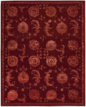 Close-up of the Nourison Regal Garnet Persian rug. Dark brown wool and silk with a floral pattern. Handmade rectangular rug.