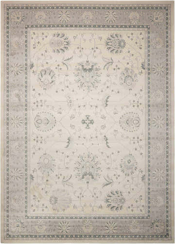 Close-up of the Nourison Maymana Ivory Persian rug, featuring a floral pattern and chestnut accents.