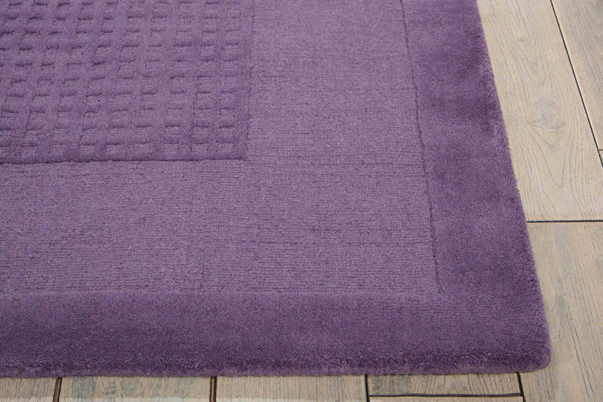 Close-up of the Nourison Westport Purple Indoor Area Rug showing wool texture and subtle geometric pattern.