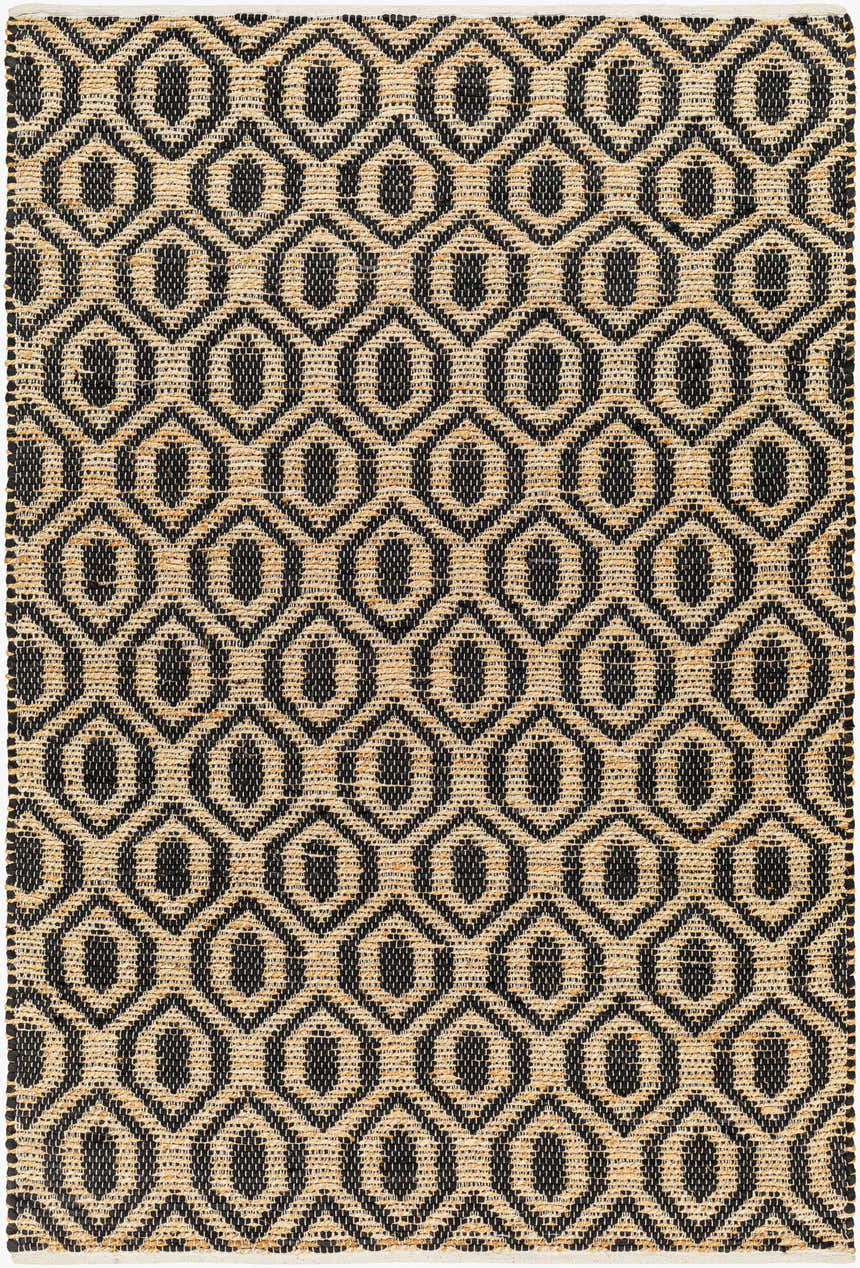 Close-up of the Isaye Charcoal Area Rug featuring a geometric dark gray and beige pattern, hand-woven jute texture. Design-Rectangle-576