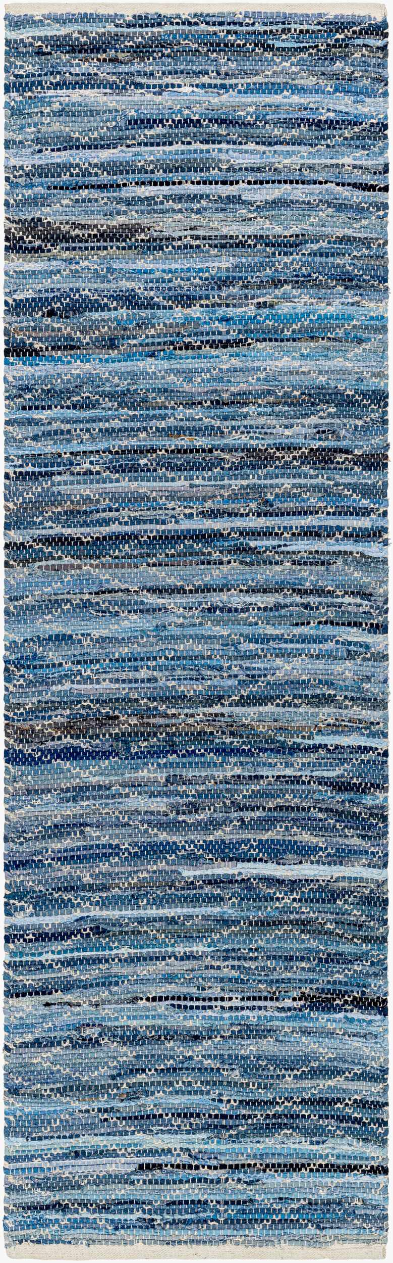 Close-up of the hand woven Gurit Blue Area Rug. Features stripes of arctic sky, navy, and silverton blue hues. Design-Runner-268