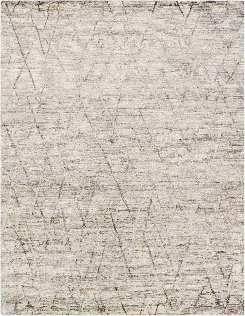 Close-up of the Nourison OCEAN Stone area rug. Sandstone color with a subtle geometric pattern and textured weave.