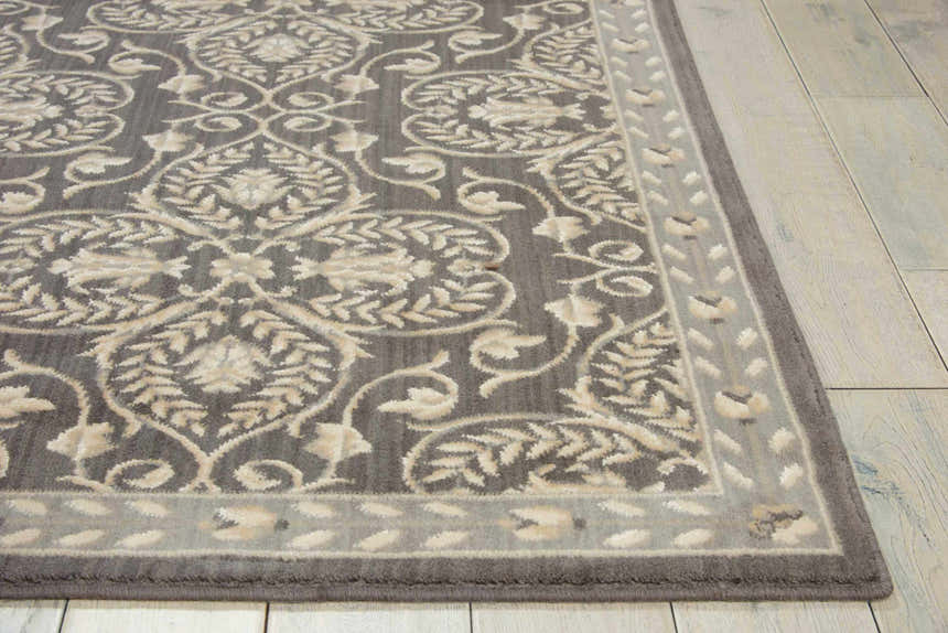 Close-up of the Nourison Riviera Graphite rug showing its wool texture and floral damask pattern.