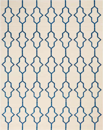 Close-up of Barclay Butera Collection Ivory/Navy Beach rug featuring a geometric trellis pattern.