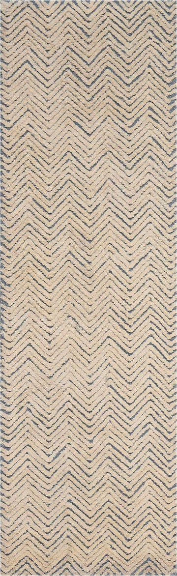 Close-up of Nourison Deco Mod Light Blue Ivory rug featuring a modern chevron pattern and soft, textured pile.