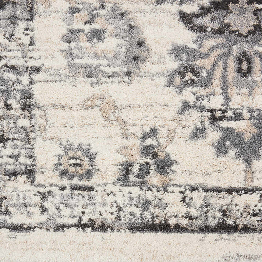 Close-up of the Nourison Fusion Cream Grey Vintage Area Rug showing its soft texture and detailed vintage pattern.