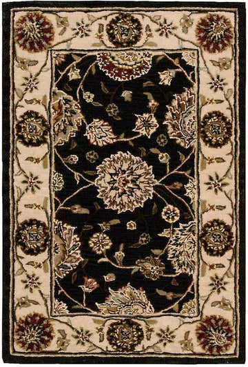 Close-up of Nourison 2000 Midnight rug. Traditional floral pattern in black, cream, and brown. Handmade wool rug.