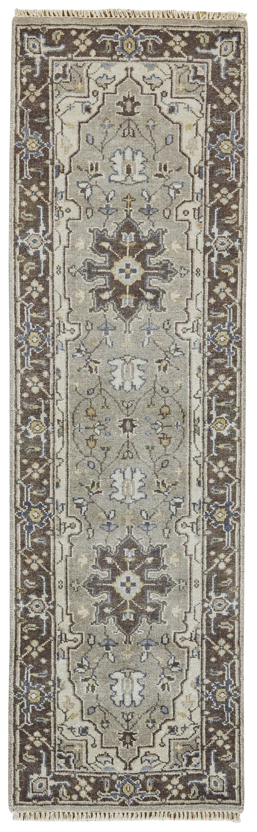 Close-up of Feizy Ustad rug. Traditional Persian design in gray, taupe, and blue. Hand-knotted wool runner rug with fringe. Design-Runner