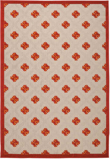 Close-up of the Nourison Aloha Red Indoor/Outdoor Area Rug. Features a red floral pattern on a textured beige background.
