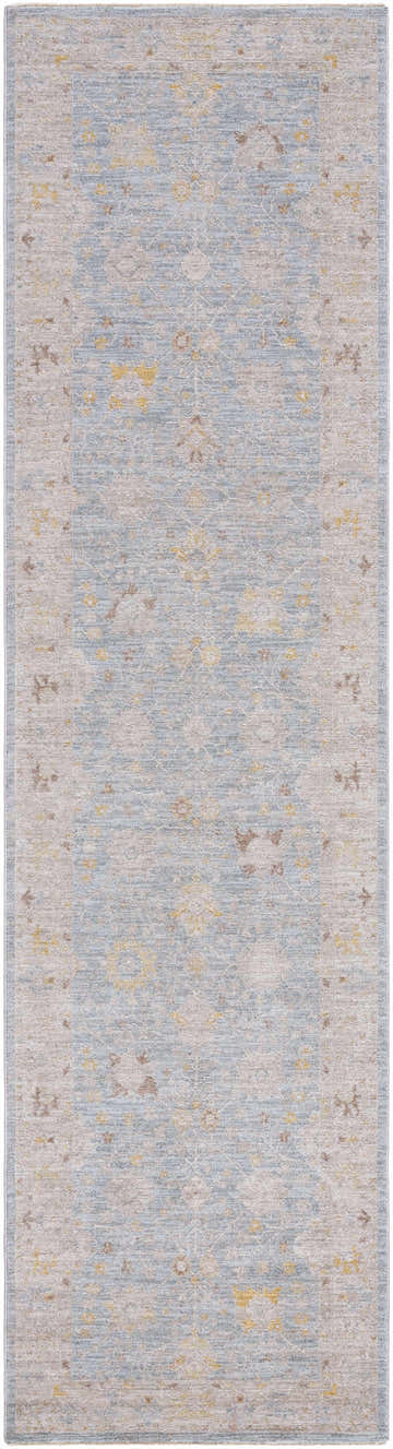 Close-up of the Kofi Thick Luxe Area Rug, a traditional runner rug with light blue, taupe, and amber floral patterns. Design-Runner-2710